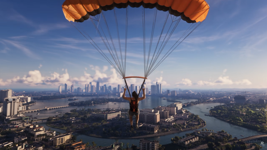 Orange parachute over Leonida’s skyline and river